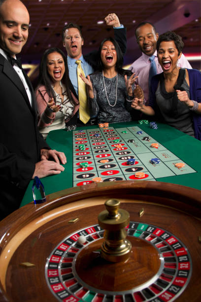 Live casino dealer at multi-camera table setup